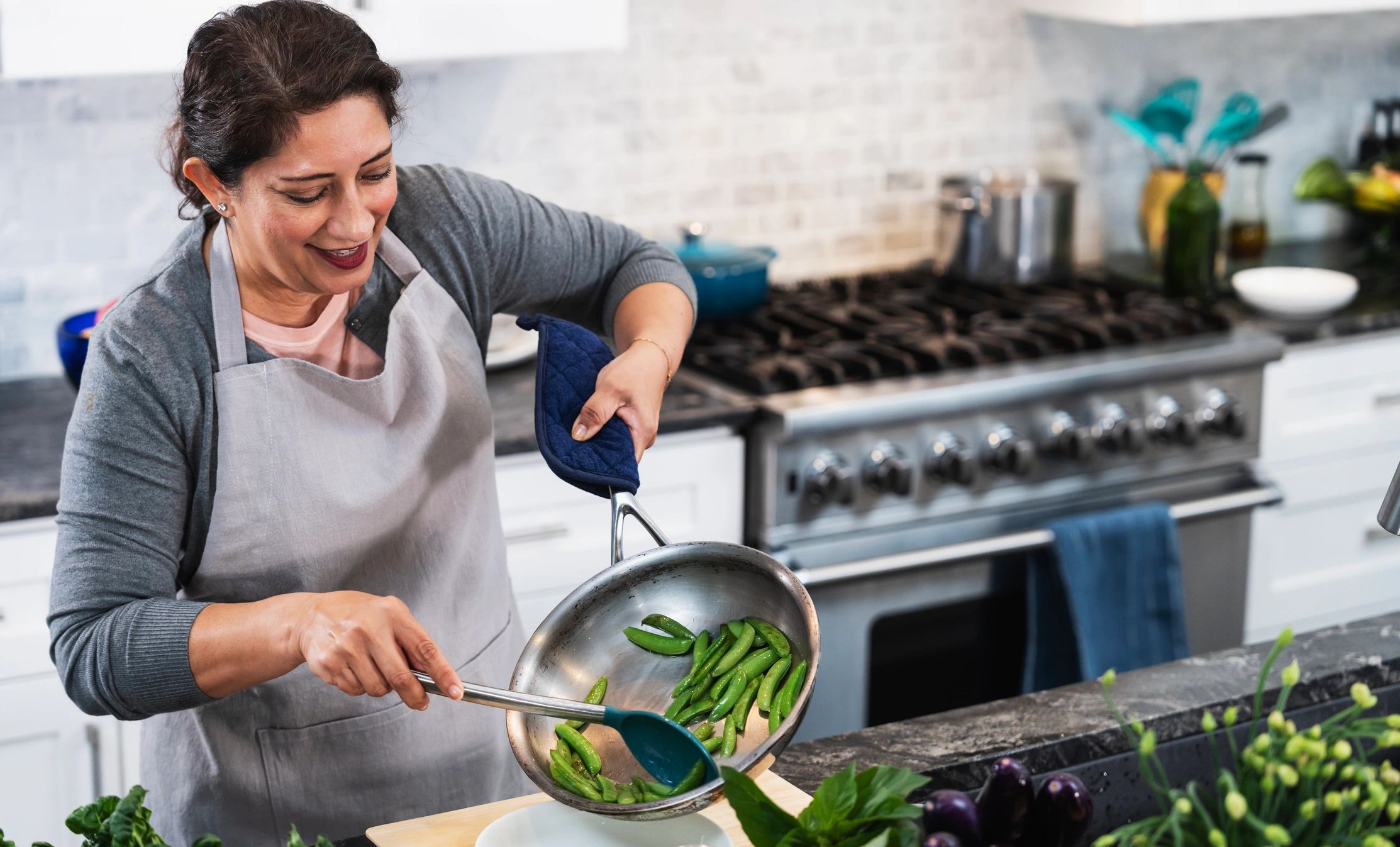 Home cook preparing a healthy meal in the kitchen