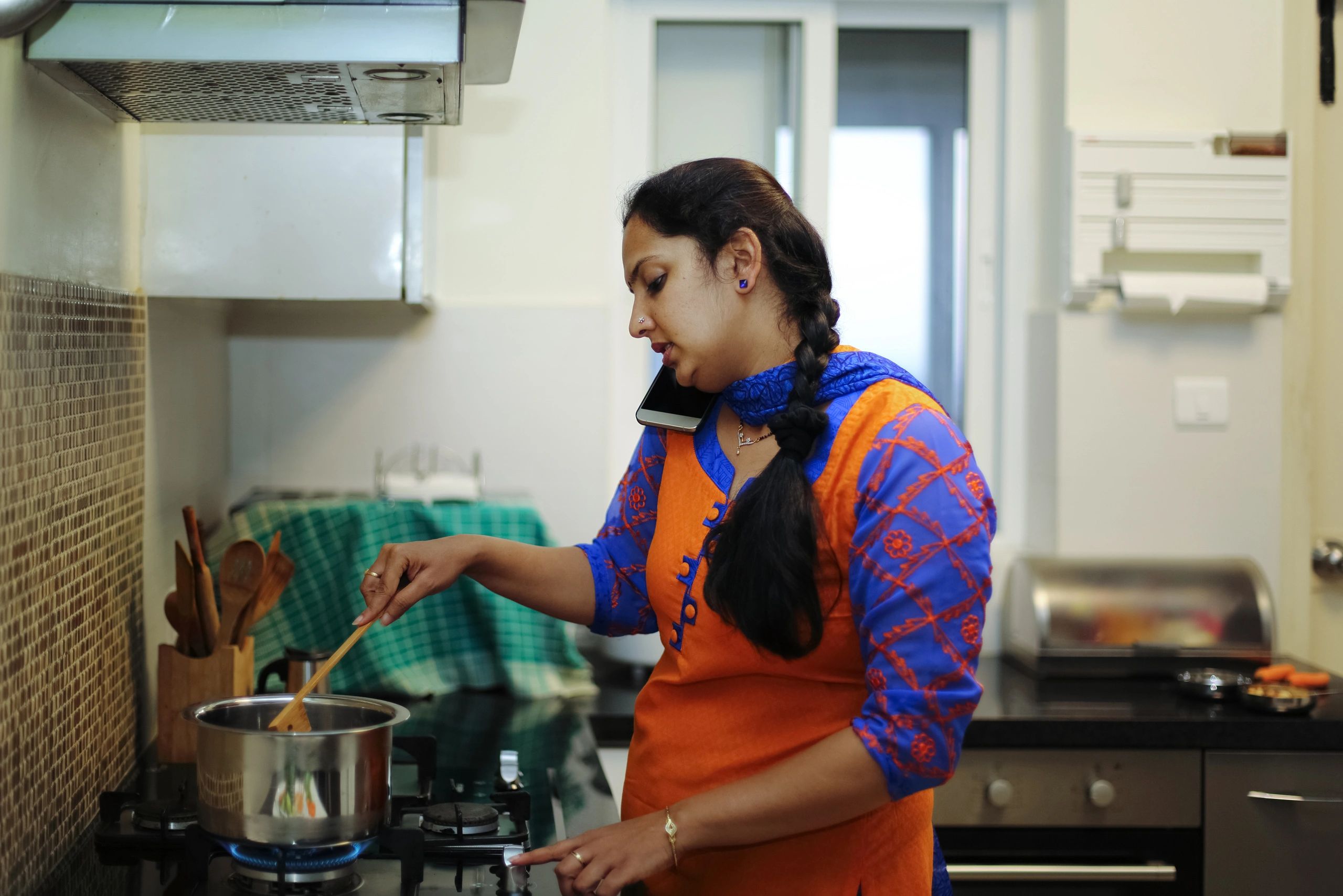 Woman cooking in a home kitchen